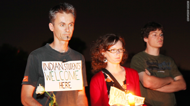 People take part in a candle lit vigil in the western suburbs of Melbourne on January 4, 2010 where Indian student Nitin Garg was fatally stabbed on January 2, 2010.