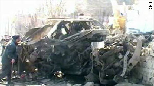 Burnt, mangled metal is all that remains of a vehicle after Wednesday's bomb blast in Pakistan.