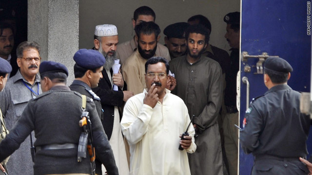 Five American terror suspects leave a court in Pakistan on Tuesday.