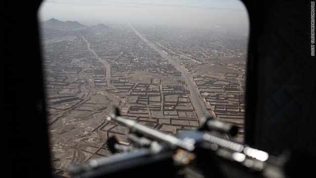 The sealed main road into Kandahar City disappears into the early morning haze, as seen on November 26.