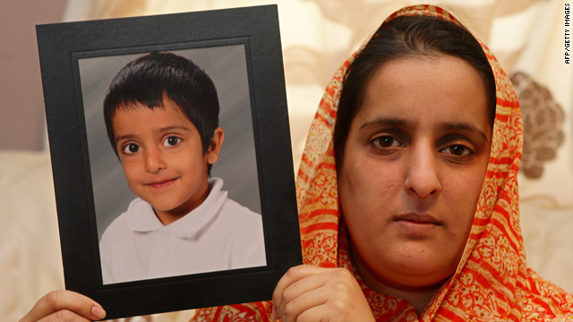 Akila Naqqash holds a picture of her five-year-old son Sahil Saeed, in Oldham, Manchester, England, on March 4.