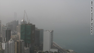The internationally recognized view across Hong Kong's Victoria Harbour is obscured by Monday's haze.