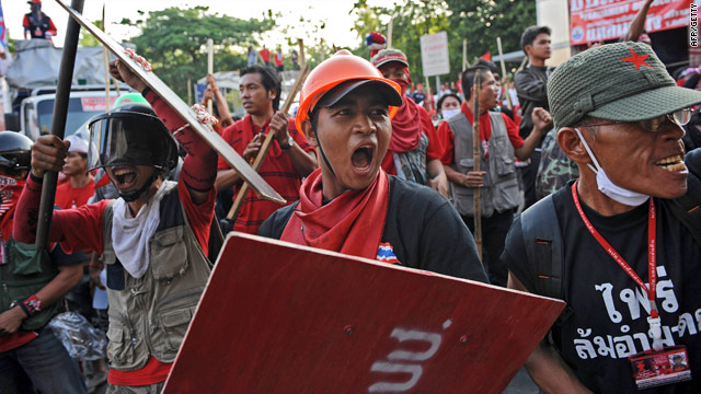 "Red Shirt" anti-government protesters take to the streets Friday in Bangkok.