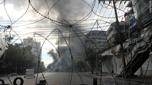 Fires burn on a boulevard near the Pratunam intersection in downtown Bangkok.