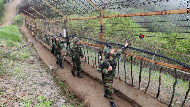 South Korean soldiers patrol along the DMZ.