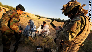 British soldiers patrol in Nahr e Saraj, Helmand on June 30, 2010.