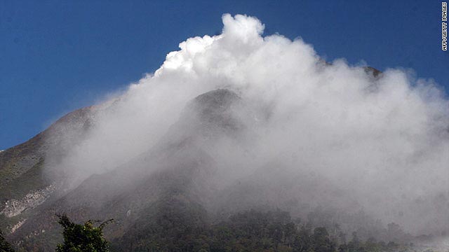 Mount Sinabung spews thick smoke after erupting in North Sumatra.