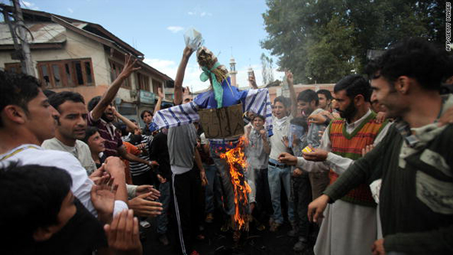 Kashmiri protesters burn an effigy representing U.S. President Barack Obama during a protest in Budgam on the outskirts of Srinagar on September 13, 2010.