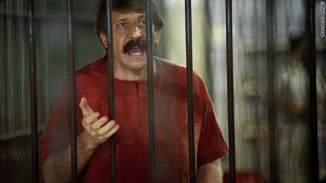 Alleged arms dealer Viktor Bout talks to the media in a temporary cell ahead of his court hearing in Bangkok.