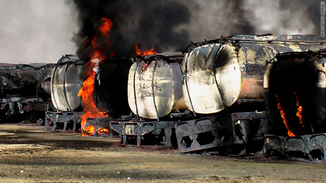 Trucks carrying fuel for NATO forces in Afghanistan burn Saturday after an attack by militants in the remote Mitri area.