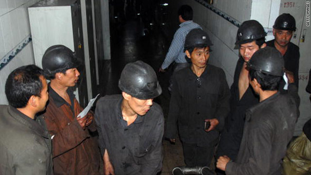 Some of the 239 miners who made it to the surface after the mine accident in central China's Henan province on October 16.