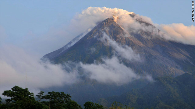 Merapi volcano spews smoke, taken from Umbul Harjo village in Sleman, Yogyakarta on early October 26, 2010.