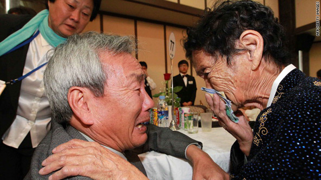 North Korean Kim Ho-Sook, right, 83, meets her South Korean brother Kim Ho-Dae during a family reunion after being separated for 60 years on Saturday in Mount Kumgang, North Korea.