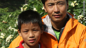 Sherpa Pemba Dorje and his son Tseten say they'll climb Everest in 2011.