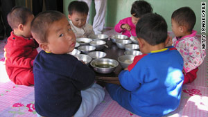 Many North Korean children, like these shown with World Food Programme provisions in 2005, battle malnutrition.