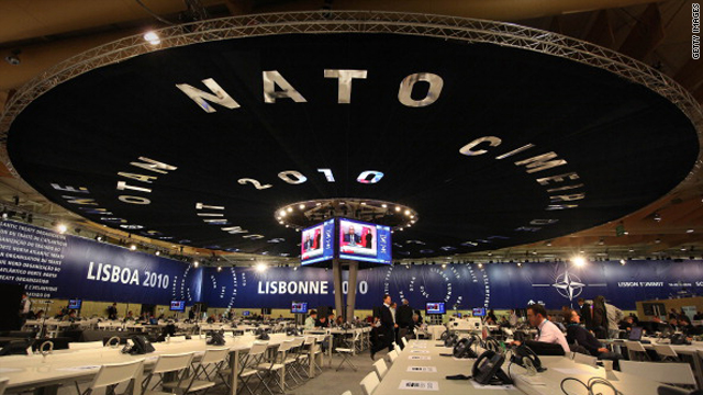 Journalists work in the press centre of the NATO Summit on November 18, 2010 in Lisbon, Portugal.