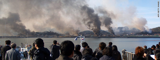 http://i.cdn.turner.com/cnn/2010/WORLD/asiapcf/11/23/nkorea.skorea.military.fire/t1pano.smoke.korea.afp.gi.jpg