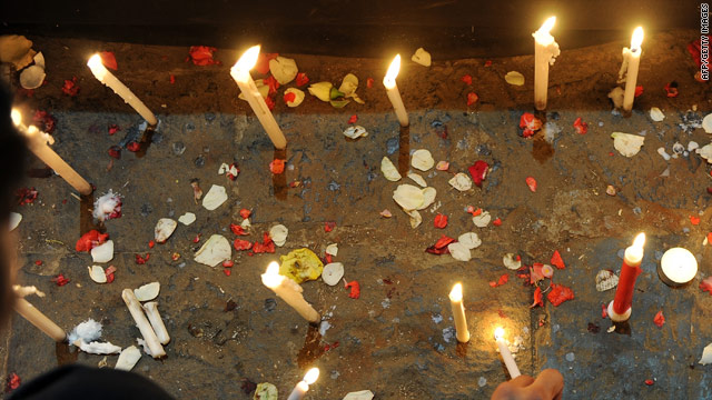 Indians light candles during a vigil to remember the 166 people killed in a terrorist attack on Mumbai in 2008.