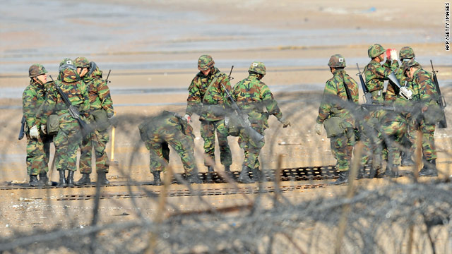 South Korean soldiers lay tracks to prepare for landing operations on a beach in Taean, southwest of Seoul on Nov. 28, 2010.