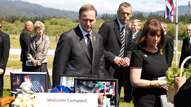 PM John Key and wife Bronagh pay respects at a memorial service for the 29 miners at Omoto Racecourse on Thursday.