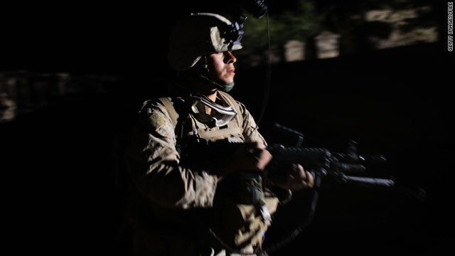 A U.S. Marine conducts night patrol in March in Helmand province, Afghanistan.