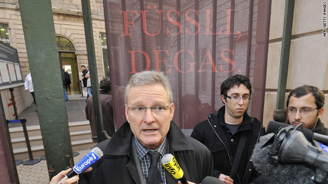 Marseille deputy mayor Daniel Hermann speaks to journalists in front of the entrance of Cantini Museum in Marseille.