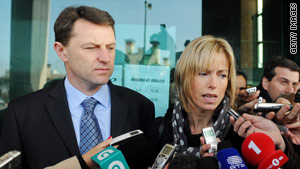 Gerry (left) and Kate McCann leave the Tribunal Civil de Lisboa in Lisbon in December.