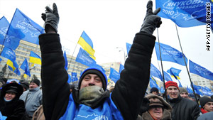 Supporters of Viktor Yanukovich celebrate in front of the Central Election Commission in Kiev.