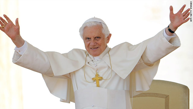 Pope Benedict XVI waves as he arrives in St.Peter's Square for his weekly general audience on Wednesday.