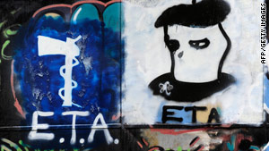 Graffiti displays the logo of Basque separatist armed group ETA in the northern Spanish Basque village of Oquendo.