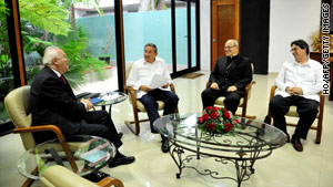 Cuban officials meet with Spain's foreign minister on Wednesday in Havana.