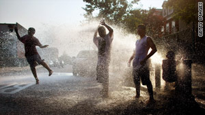 New Yorkers in the Bronx seek refuge from the heat June 10.