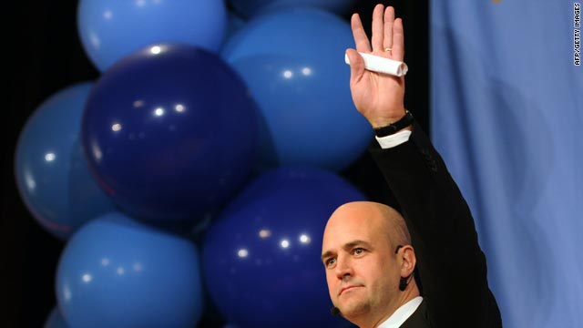 Swedish PM Fredrik Reinfeldt addresses party workers and activists after the election result Sunday in Stockholm.