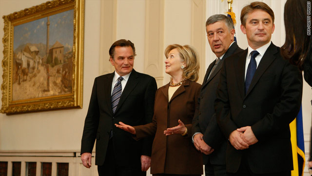 U.S. Secretary of State Hillary Clinton talks with members of the Bosnian tripartite presidency in Sarajevo on October 12, 2010.