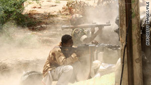 Somali government fighters battle militants in Mogadishu last month.