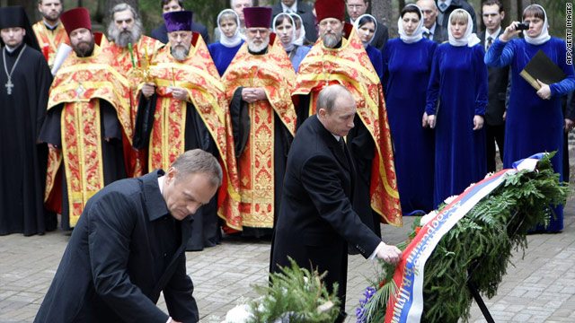 Russian PM Vladimir Putin and Polish PM Donald Tusk lay tributes at the memorial museum to the Katyn massacre, April 7, 2010.