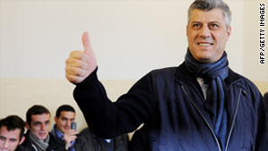 Prime Minister Hashim Thaci gives the thumbs up at a polling center on Sunday.