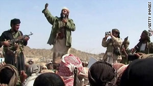 A man claiming to be a member of al Qaeda addresses a crowd in Yemen's southern province in December.