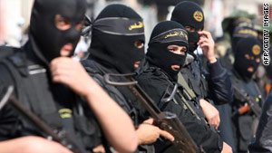 Islamic Jihad militants Monday attend the funeral of a comrade killed in Gaza on Sunday. Two others also died Sunday.