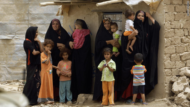 Iraqi women and children at the Chikouk camp for the internally displaced in northwestern Baghdad on July 21, 2009.