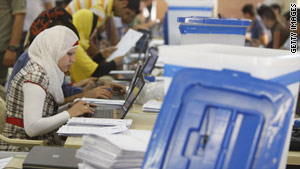Staffers continue to count ballots from the March 7, 2010, Iraqi elections.