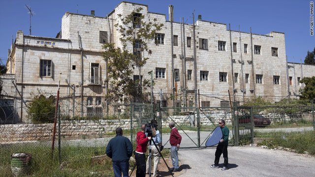 A camera crew stands outside the former Shepherd Hotel in East Jerusalem, which will be torn down for new housing.