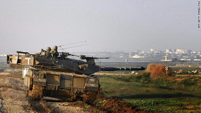 An Israeli tank takes up a position near the Israel-Gaza border in December 2008.