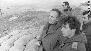 Shimon Peres, pictured left in  1976 during his tenure as Israeli defense minister.