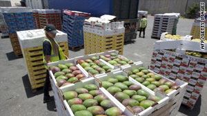 Israeli security agents check goods bound for Gaza at a terminal on the border last week.