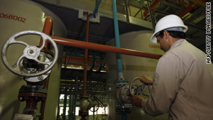 A technician works at a nuclear processing facility near the Iranian city of Qom.