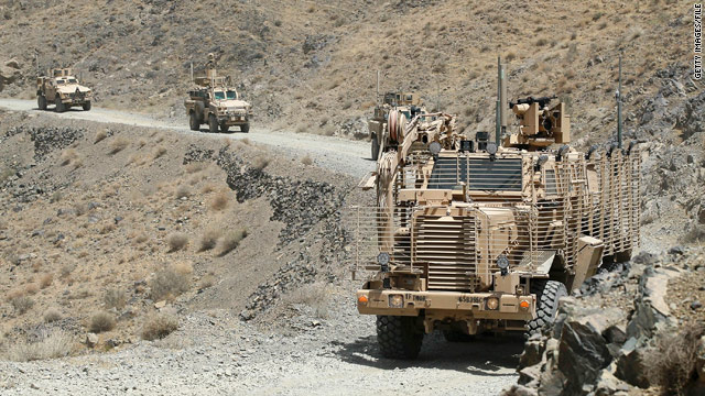 U.S. troops drive through a valley in Afghanistan last week on a mission to clear improvised explosive devices.