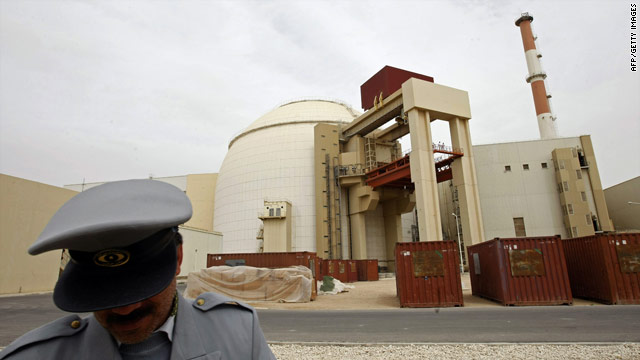 A file photo dated February 25, 2009, of an Iranian security guard outside the Bushehr nuclear power plant.