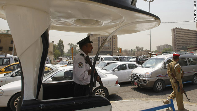 A police officer on duty in central Baghdad following a spate of shootings targeting police and civilians on August 15, 2010.