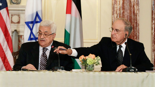 U.S. special Mideast envoy George Mitchell (R) -- pictured here with President Mahmoud Abbas -- will arrive in Israel Tuesday.